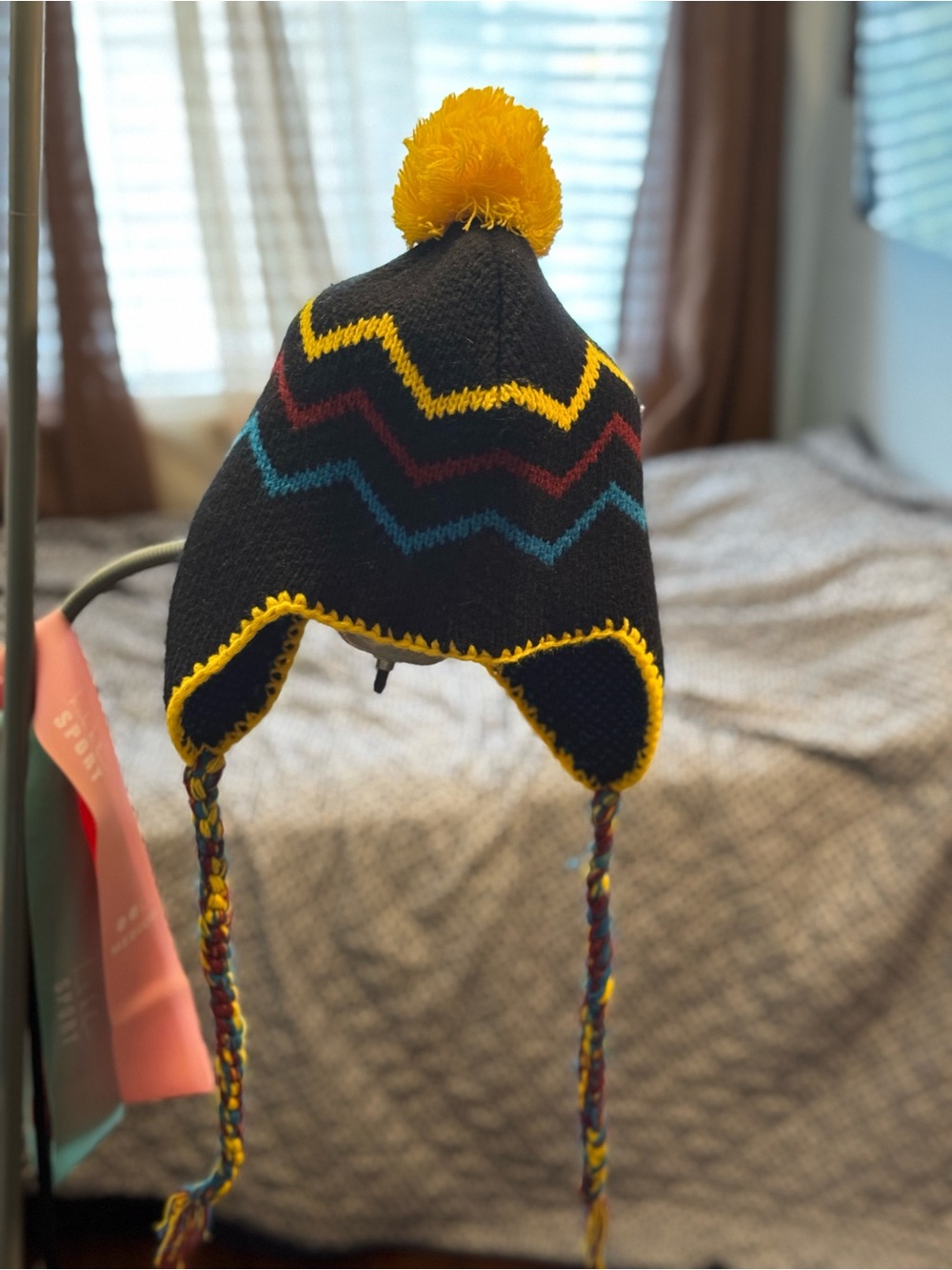Youth Black Knit Earflap Hat with Yellow Pom and Zigzag Accents